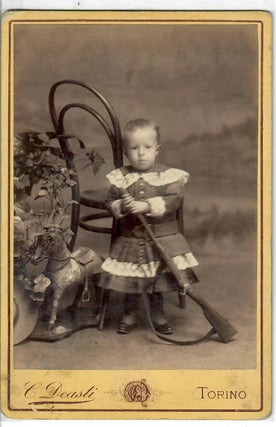 Item #31903 [Young Italian Boy with Gun and Toy Horse]. C. Deasti, photographer