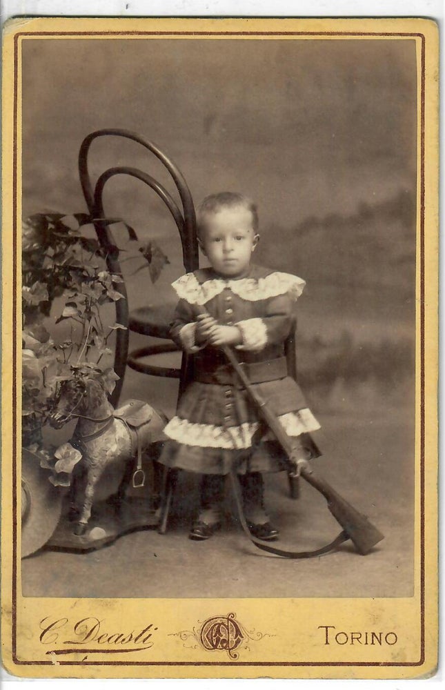 Item #31903 [Young Italian Boy with Gun and Toy Horse]. C. Deasti, photographer.